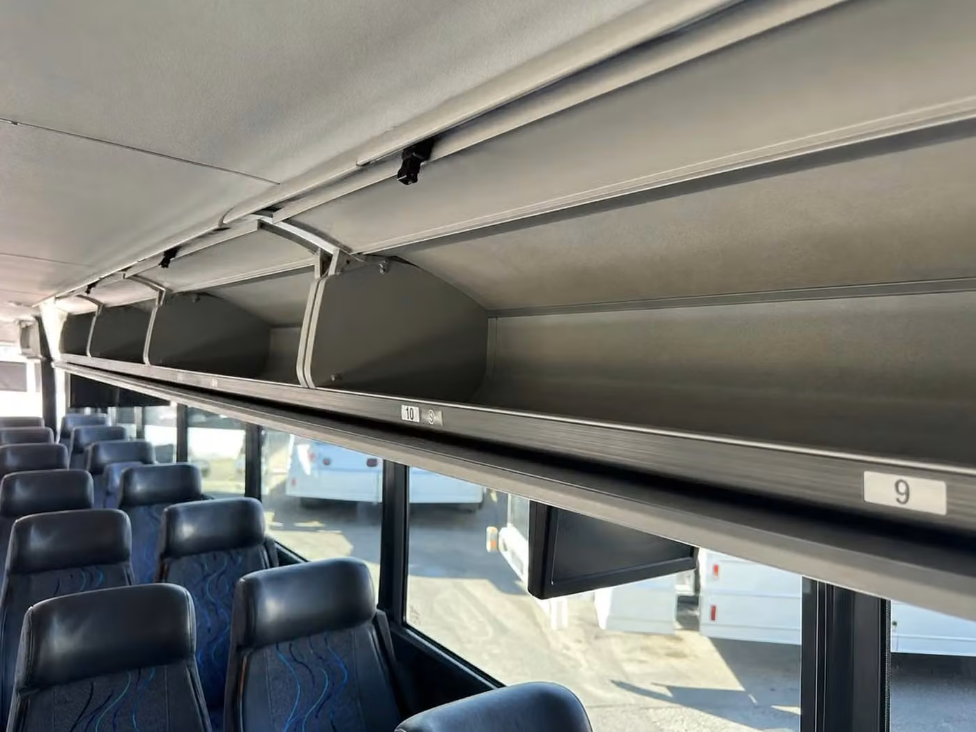 naugatuck 25 passenger minibus overhead storage